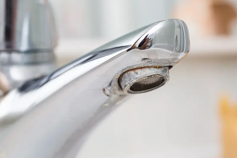 hard water stains on faucet